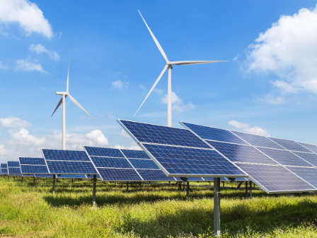 solar panels and wind turbines in power station