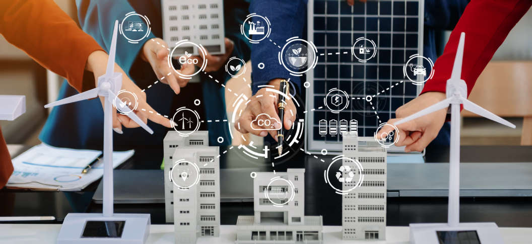4 people point to a visualised energy system model