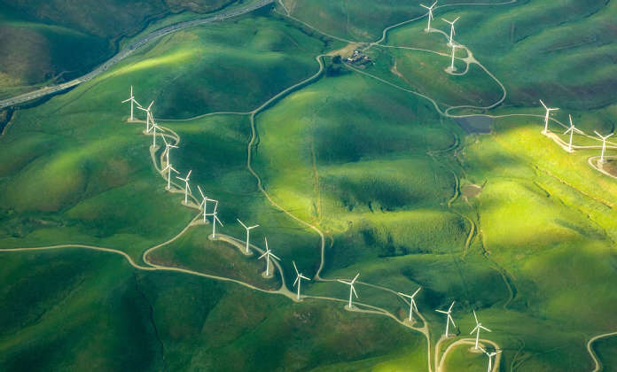 Green hilly landscape with photovoltaic systems